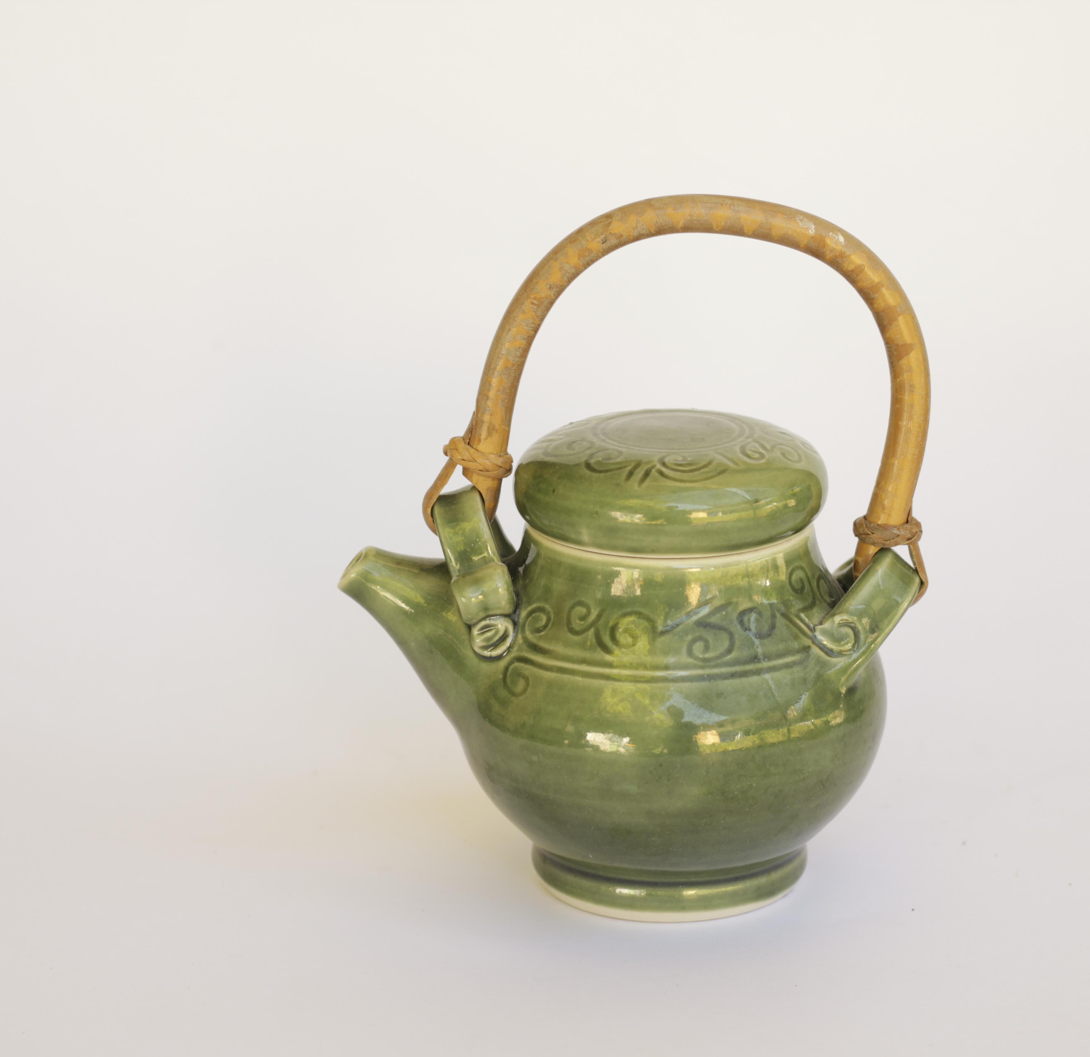 one cup carved green teapot pj pottery