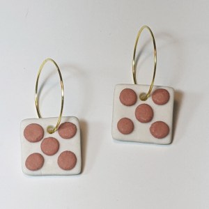 square earrings with pink dots